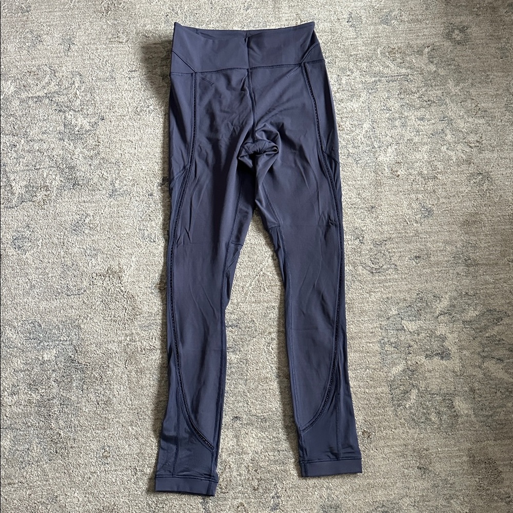 Lululemon women’s tights 
Size 8
Color plum colored